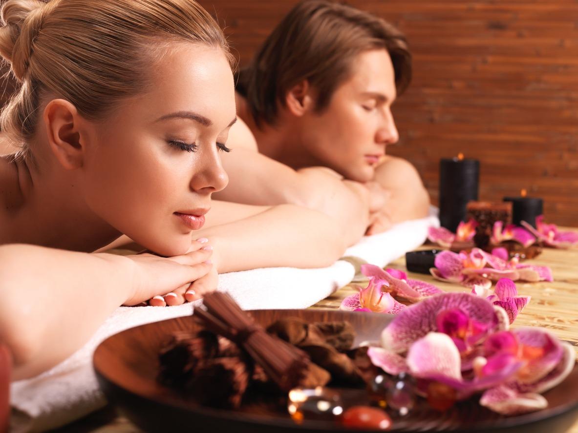 Attractive couple relax at the spa salon. Beauty treatment concept.